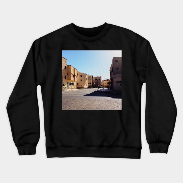 Man Riding Bicycle Through Moroccan Suburb Crewneck Sweatshirt by visualspectrum